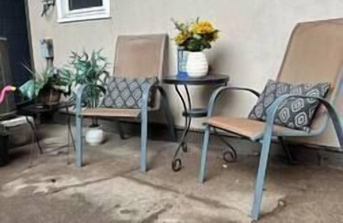 Moline Apartment | Retro & Modern Downtown w/Deck, Fire Pit, Pac Man