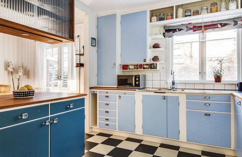 Skarpnack Apartment | Retro Retreat with Modern Comforts