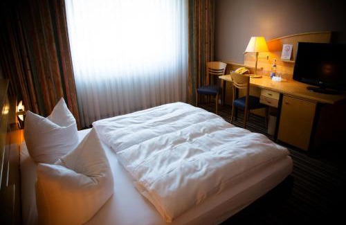 Woerrstadt Hotel | Rheinhessen Inn GmbH