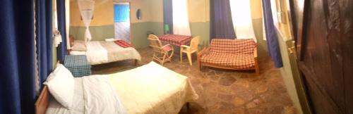 Maasai Mara Bed & Breakfast | Rhino hillside