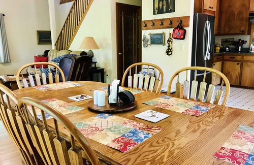 Cornelia House | Right on the ChattahoocheeRiver - visit Helen, fish off deck, or enjoy fire pit.