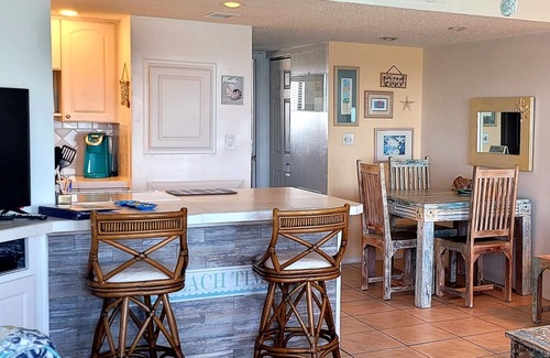 Sunset Beach Condo | Right on the Gulf! Beautiful white sandy beachfront! Safe, quiet, and friendly!