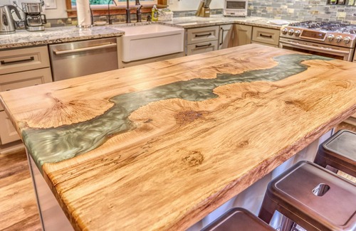 Welches Cabin | Ripplewood, a serene riverfront cabin, decks, hot tub, BBQ, dog-friendly