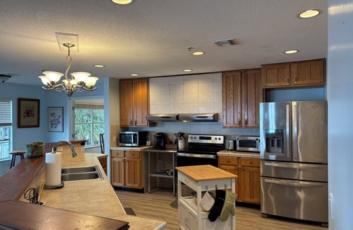 Sebastian House | River HousenEnjoy fishing, boating & birding from large family home on the river