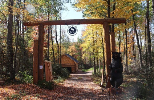 Crystal Falls Cabin | RIVER RENTAL NEW LOG CABIN-POOL SPA ON THE PAINT RIVER-DOCK-CANOES FISH GOLF ORV