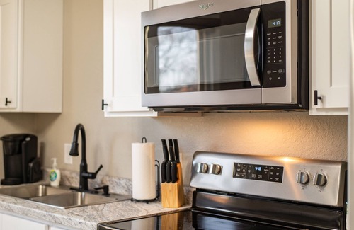 Cape Girardeau Apartment | River's Dawn - Modernized Historic Home - River Views - King Bed - Fast Wifi