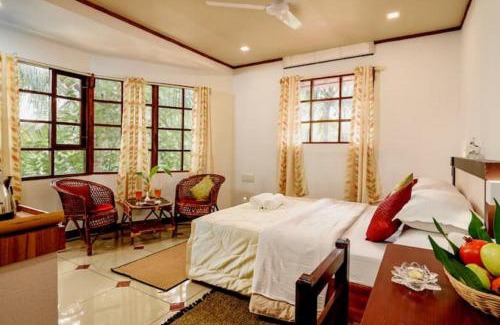 Aymanam House | Riverdale Homestay Kumarakom by LexStays