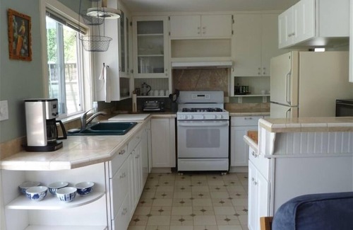 Old Bend Cottage | Riverfront Beauty! Location Perfection! Walk to the best of Bend