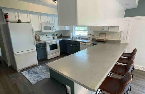 Newaygo House | Riverfront Blissful Cottage