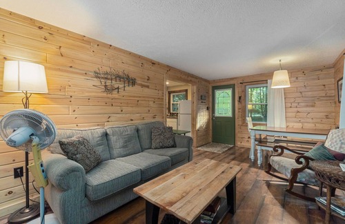 Frankfort House | Riverfront cabin on the Betsie with private dock, kayaks & bikes - 2 dogs OK