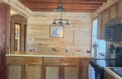 Luzerne Cabin | Riverfront Cabin: The Cozy Southern Brook Trout Lodge