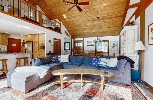 McCall House | Riverfront Cabin with private hot tub, sauna, loft, fireplace, and free WiFi