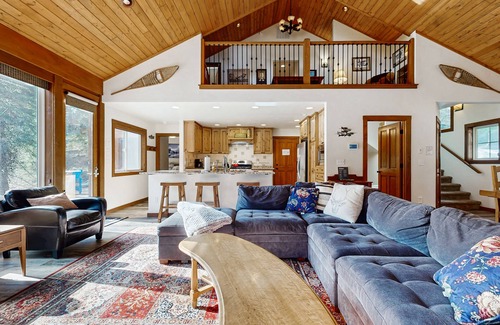 McCall House | Riverfront Cabin with private hot tub, sauna, loft, fireplace, and free WiFi