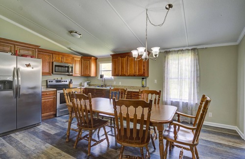 Mendota House | Riverfront Cattle Farm Home in the Mountains