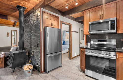 Leavenworth Cabin | Riverfront Chalet, 2 Bedroom + Loft, Sleeps 4 guests, with a hot tub.