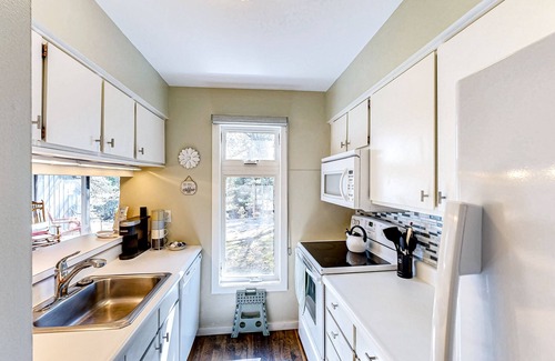 Glen Arbor House | Riverfront condo with lake access, views, deck, washer/dryer, community firepit