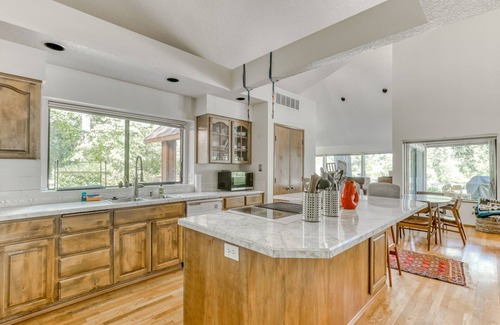 Carver House | Riverfront, dog-friendly home with gorgeous setting, floating tubes & grand piano