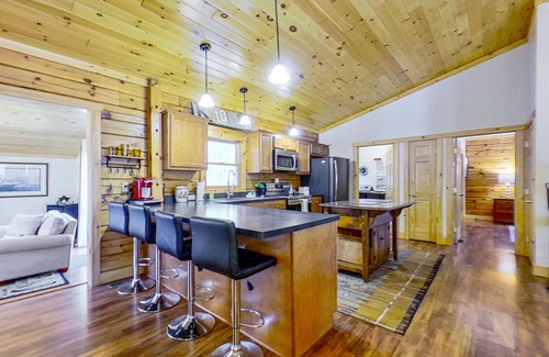 Warrensburg House | Riverfront dog-friendly house near skiing with firepits, wood stove & beach