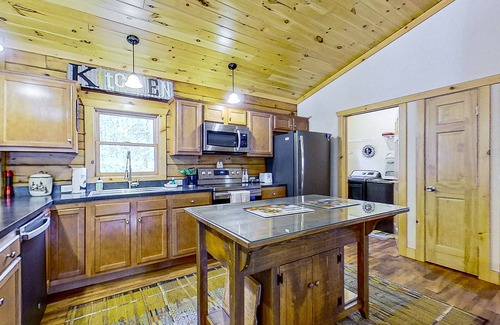 Warrensburg House | Riverfront dog-friendly house near skiing with firepits, wood stove & beach