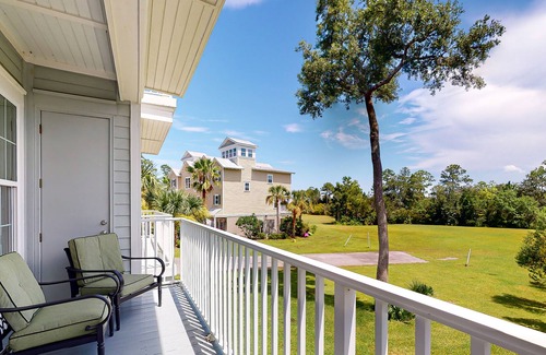 St. Marys House | Riverfront dog-friendly townhome with fireplace, dock access & pickleball
