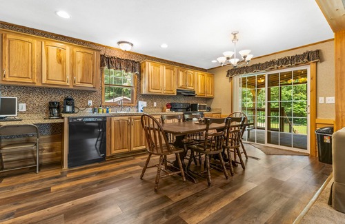 Schroon Lake House | Riverfront home with huge screened deck - dog-friendly & fast WiFi