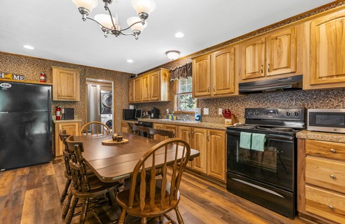 Schroon Lake House | Riverfront home with huge screened deck - dog-friendly & fast WiFi