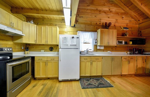 Millers Creek Cabin | Riverfront Log Cabin w/Private Waterfall, Firepit & Panoramic Deck