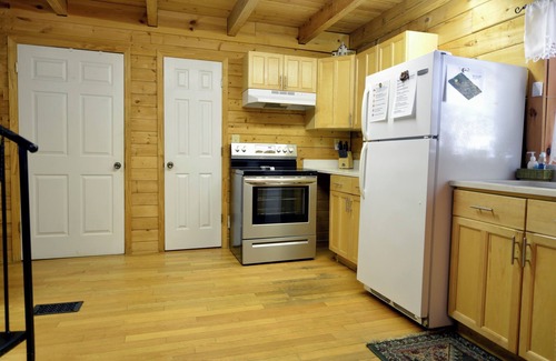 Millers Creek Cabin | Riverfront Log Cabin w/Private Waterfall, Firepit & Panoramic Deck