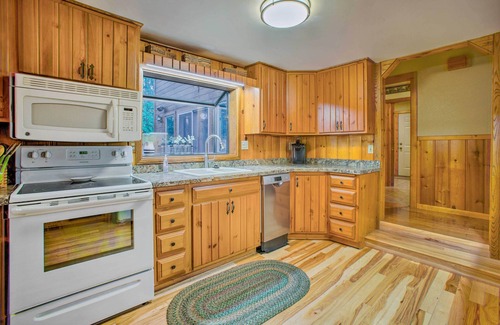 Manton Cabin | Riverfront Manton Cabin w/Pool Table & Fire Pit!