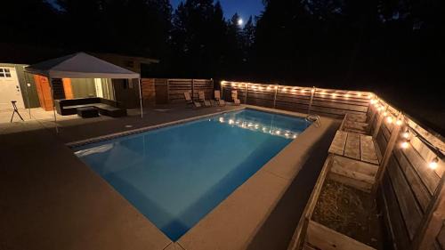 Trail House | Riverfront Oregon retreat with hot tub and pool