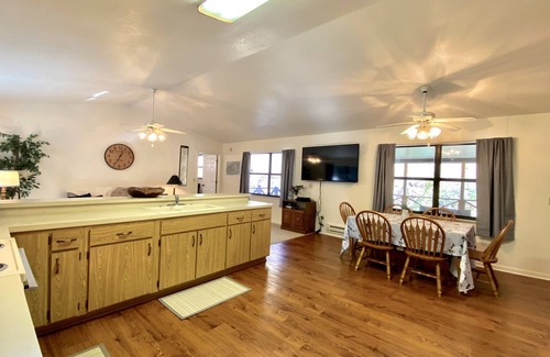 Bryson City Cabin | RIVERFRONT Retreat with HOT TUB on Nantahala River