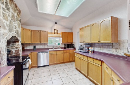 Seguin House | Riverfront retreat w/wraparound deck, gas grill, free WiFi, & central AC