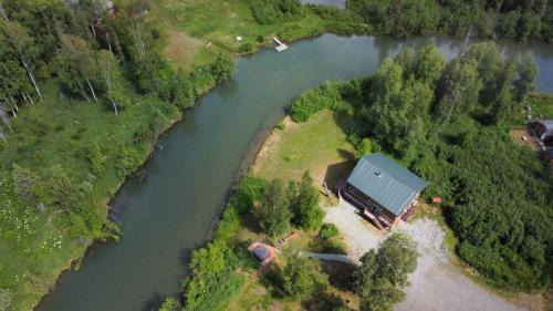 Houston House | Rivers Edge Retreat - A true Alaskan experience! Secluded location on the river providing a private peaceful getaway, minutes from town