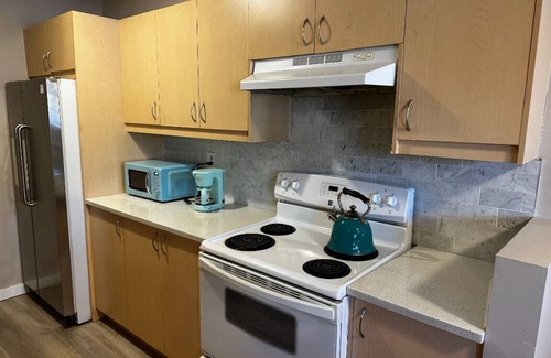 Sunnyside House | Riverside Bliss: 3-Bed Basement Suite