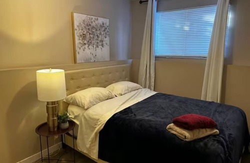 Sunnyside House | Riverside Bliss: 3-Bed Basement Suite