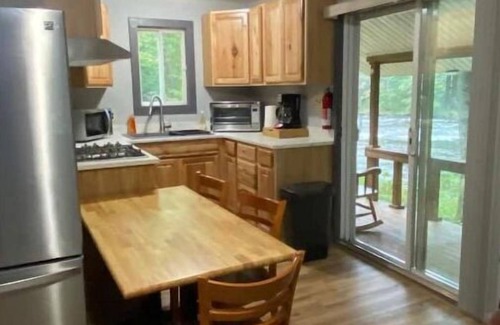 Constable Cabin | Riverside cabin, fly-fish for trout or just relax!