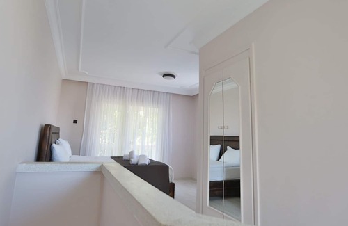 Karavas Villa | Riverside Coastal Retreat