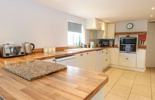 Stalham Cottage | RIVERSIDE COTTAGE, pet friendly, with open fire in Stalham