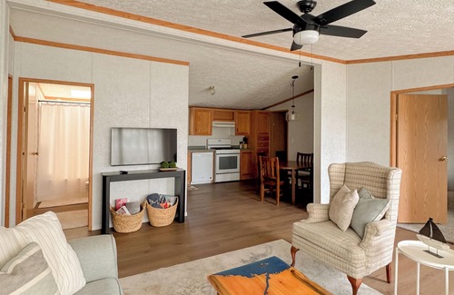 Cheboygan Cottage | Riverside Cottage w/70' Private Dock - 5 Minutes From Town!