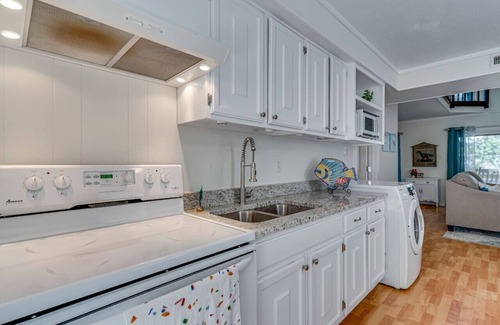 Coles Point House | Riverside Dreams -golfcart-views-screened porch-