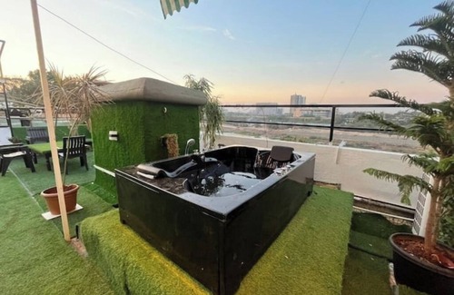 Koregaon Park Apartment | Riverside Jacuzzi Terrace patio with safety