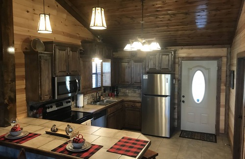 Smithville Cabin | Riverside Landing right on the Mountain Fork River! Kayaks INCLUDED!