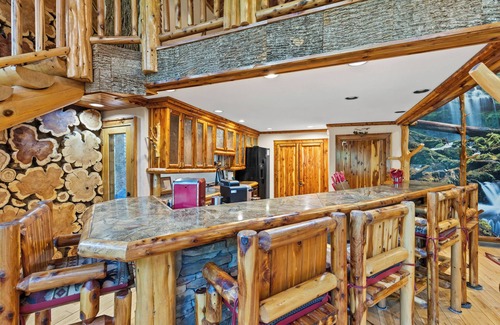 Ellijay Cabin | Riverside Luxury: Hot Tub, Fire Pit & Fishing Dock! Game Room, Fireplace!