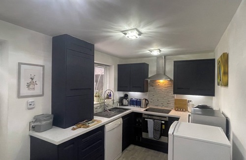 Abergavenny House | Riverside Two Bedroom Townhouse in Abergavenny with Car Charger.