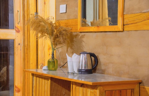 Banjar Cottage | Riverside wooden cottages with a great valley-scape