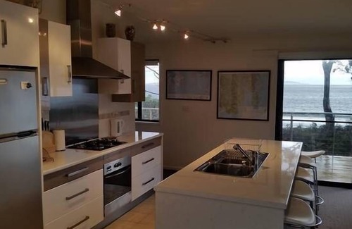 Surveyors Bay House | Roaring Beach Retreat - pet friendly, beachfront
