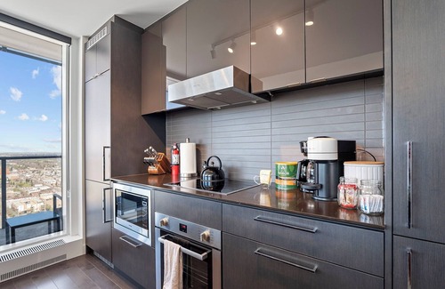 Downtown Edmonton Apartment | Roger - Luxury ICE District Suite - Pool & Parking
