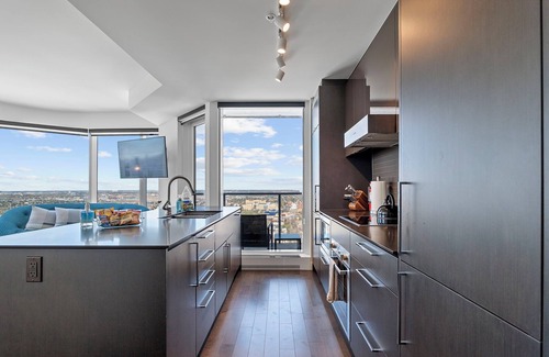 Downtown Edmonton Apartment | Roger - Luxury ICE District Suite - Pool & Parking