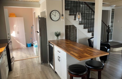 Bonavista House | Rolling Cove Cottage- 3 Bedroom House with Covered Hot Tub. Central Location.