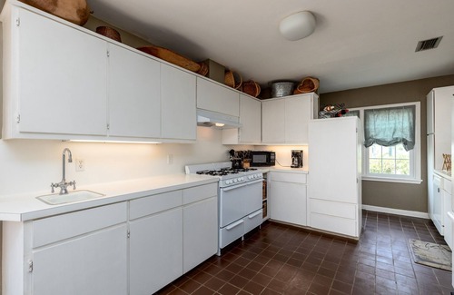 Bay Area House | Romantic 1938 Bay House Steps from Ocean Dr Porches, Gardens & Coastal Charm